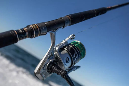 PENN Slammer IV DX reel in action, showcasing advanced reel technology for enhanced fishing performance and durability